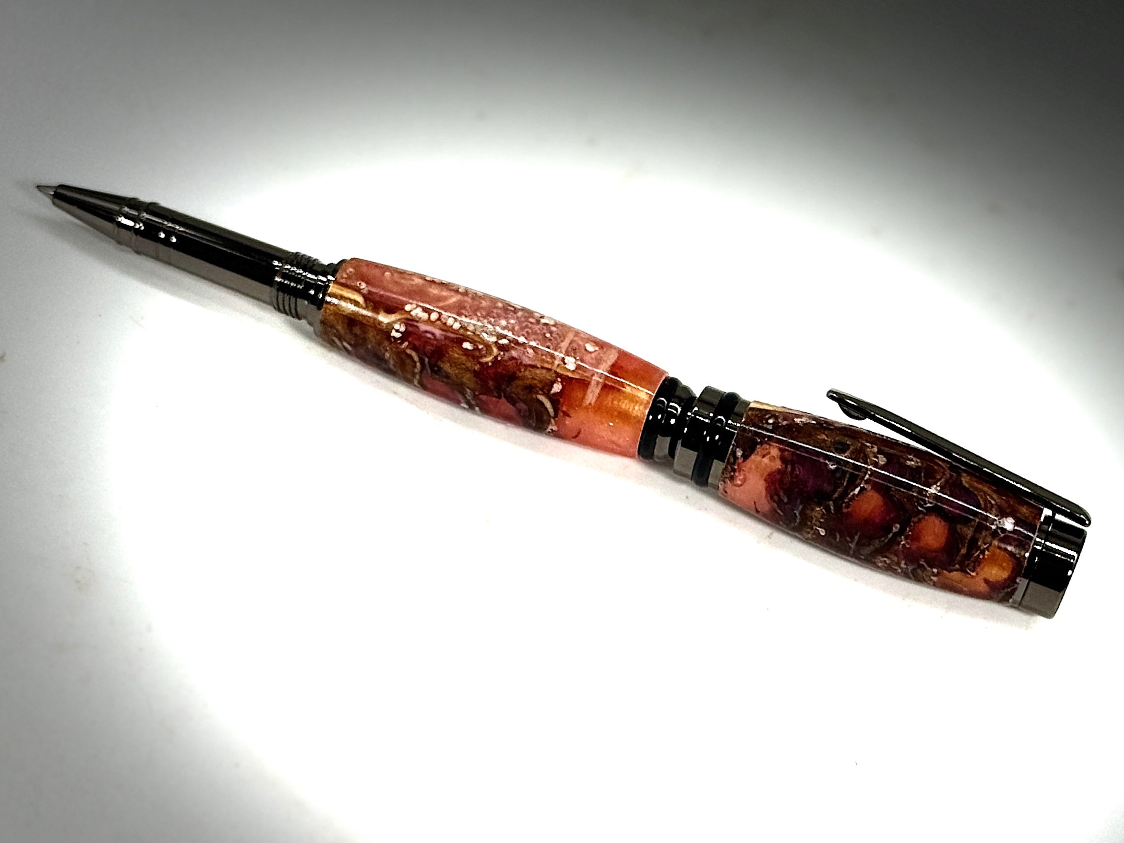CAMERON ROLLER BALL PEN  GUN METAL-PINE CONE IN RED RESIN
