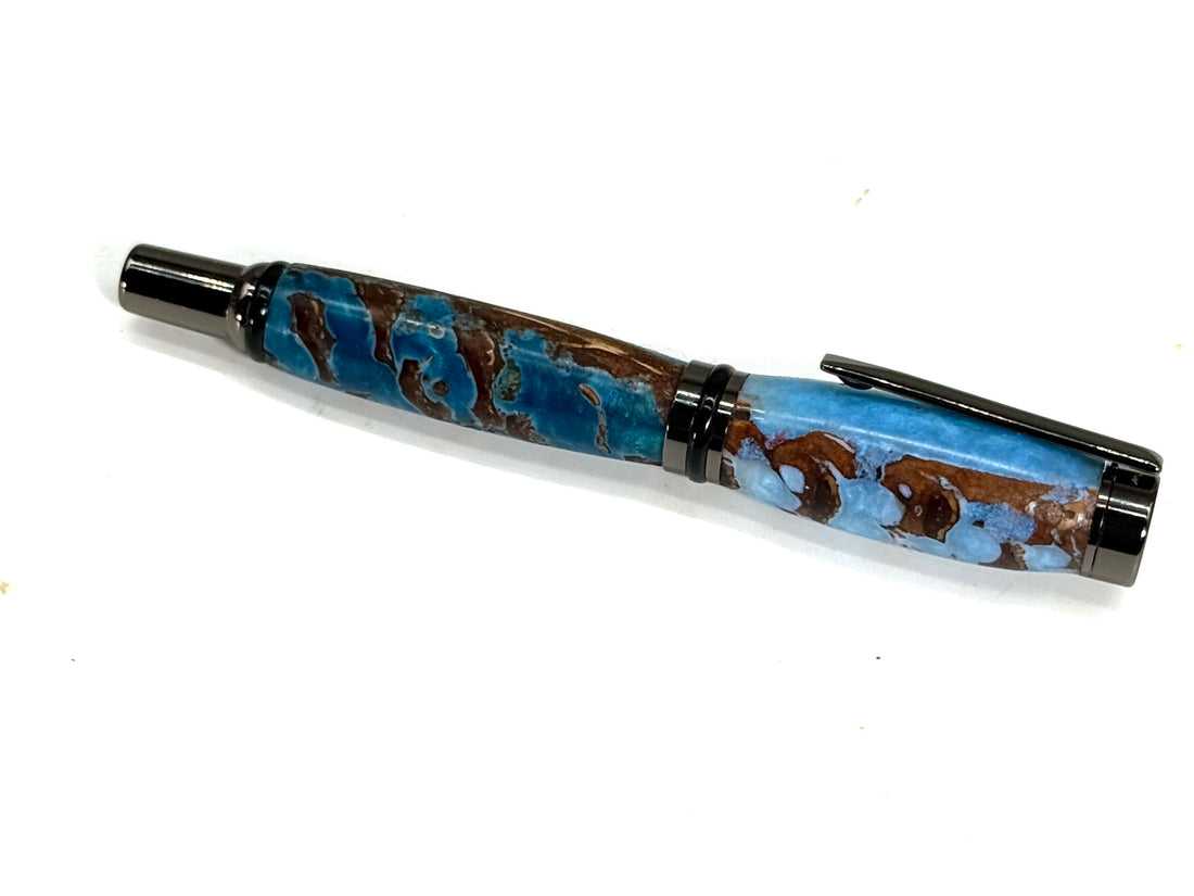 CAMERON ROLLER BALL PEN -PINE CONES IN BLUE RESIN
