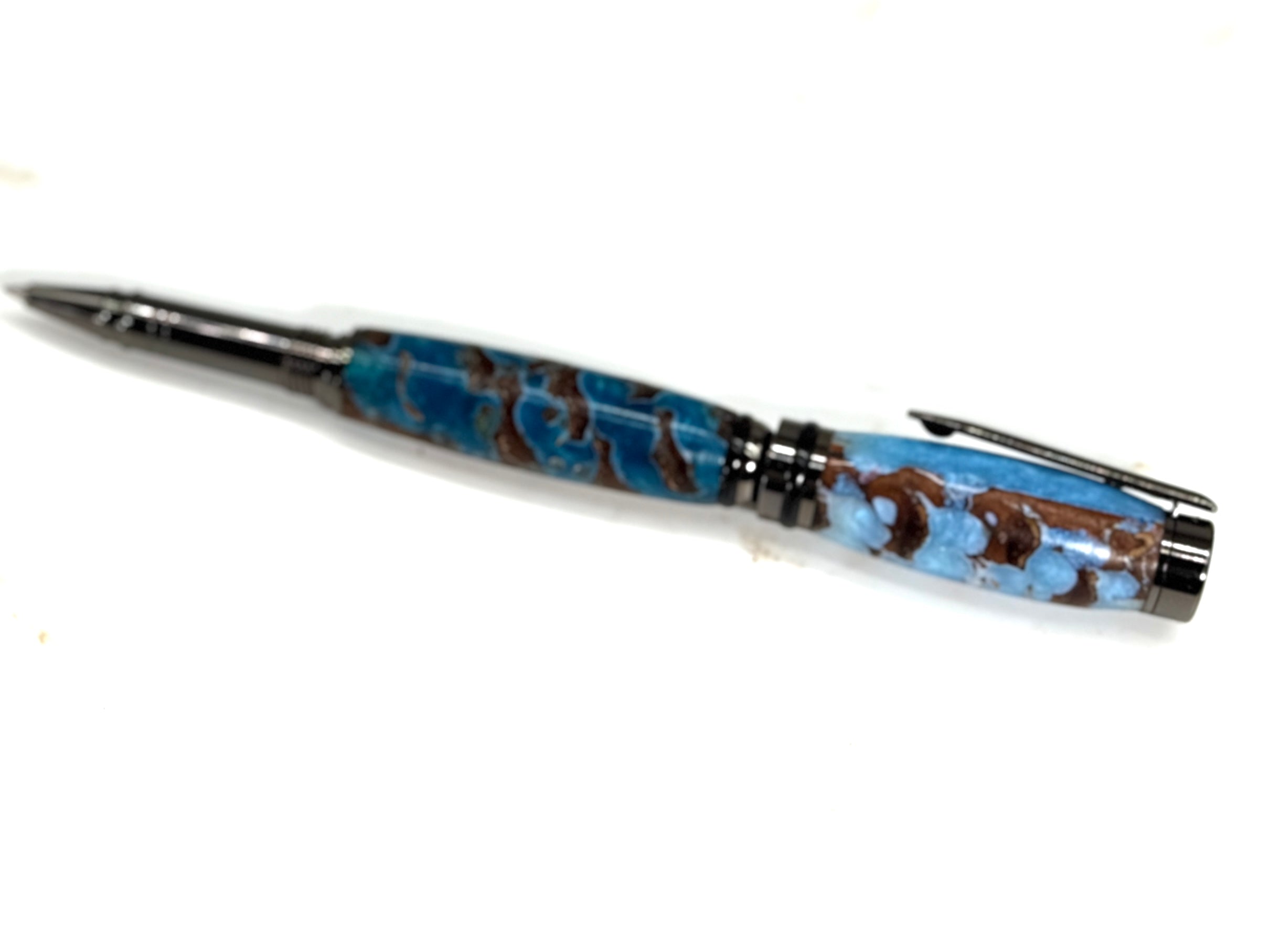 CAMERON ROLLER BALL PEN -PINE CONES IN BLUE RESIN